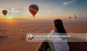 Solo traveller enjoying a hot air balloon ride over Dubai desert.