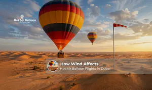 Hot air balloon flying over Dubai desert in changing wind conditions.