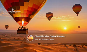 A hot air balloon floating over the Dubai desert during a festive Diwali sunrise experience.